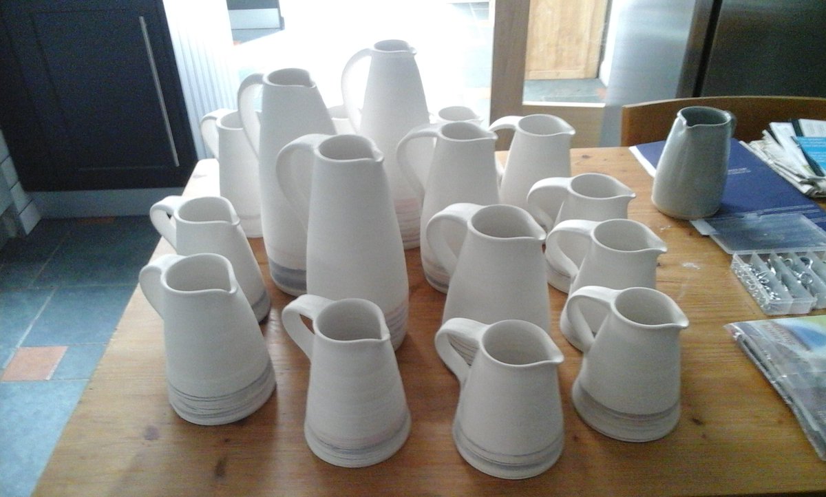OlleyDesign's tweet image. Jugs came out of bisque firing unscathed - onto glazing next! #SEOpenStudios #potterythrowdown #pottery #ceramics