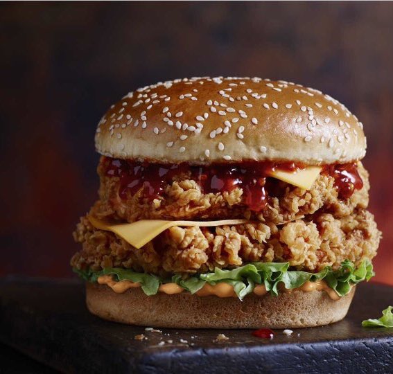 CluckinBell_'s tweet image. The Cluckin' Stacker; full of zinger sauce with stacked chicken breast, lettuce and cheese. $2.99