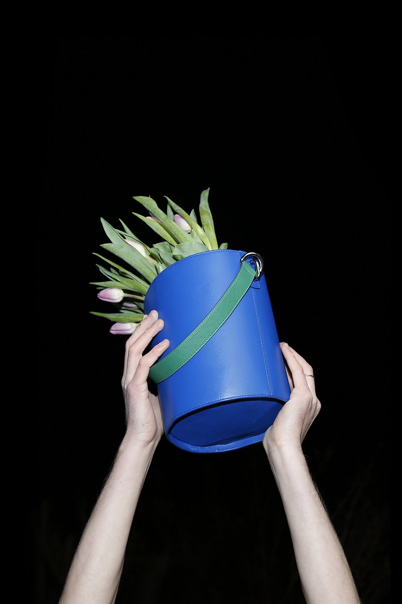 POP SHOPPING! Lady with Handbag featuring the <a href="/JW_ANDERSON/">JW ANDERSON</a> Bucket bag: thepop.com/jwanderson-blu…