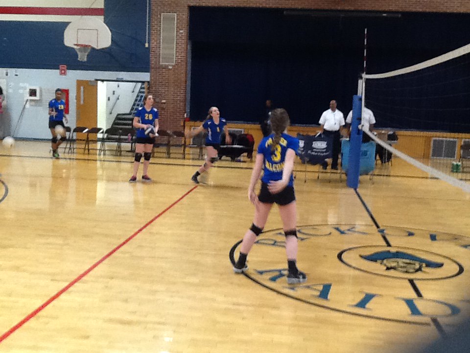 Parker 8th grade girl's volleyball team warms up prior to the IESA Sectional game.