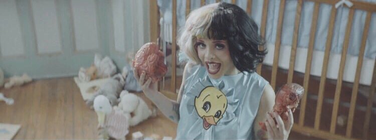 billboard's tweet photo. Watch @MelanieLBBH get delivered by a doctor in a rabbit mask in haunting #CryBabyMusicVideo https://t.co/WWV7YJkFiX https://t.co/CmjKJUYP6U
