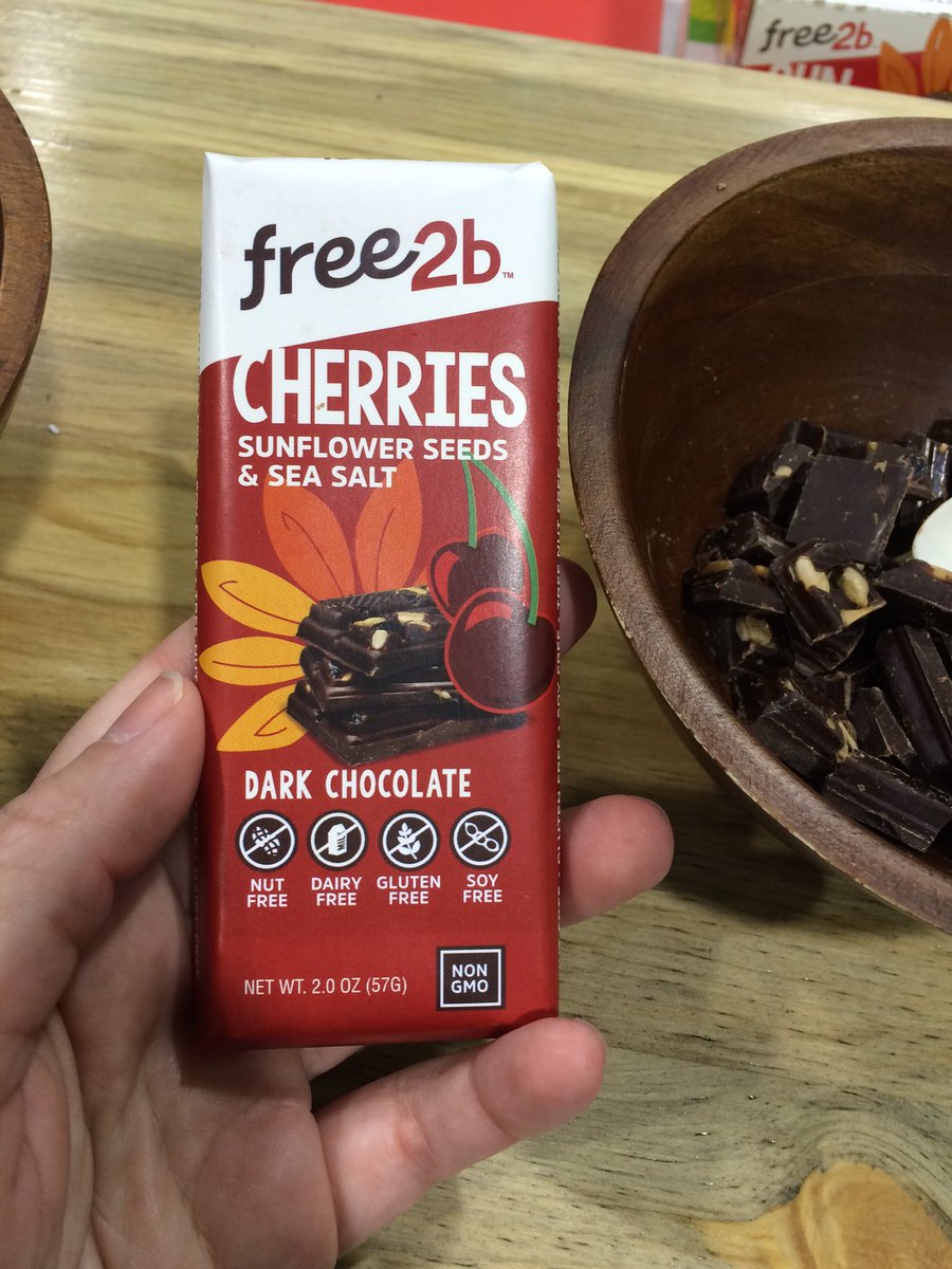 CeliacBeast's tweet photo. . @Free2bFoods new launches: chocolate bars! Check out this cherry sunflower seed bar! #ExpoWest #ewblogger https://t.co/sSWbFmYA3i