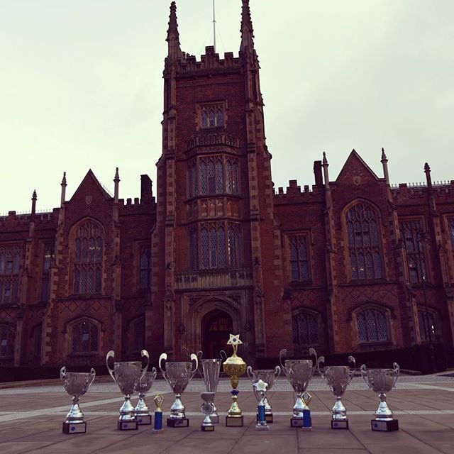 QUBKnights's tweet photo. Don't our trophies look pretty lined up in front of the #LanyonBuilding? #loveQUB https://t.co/xhSdP35ZtY