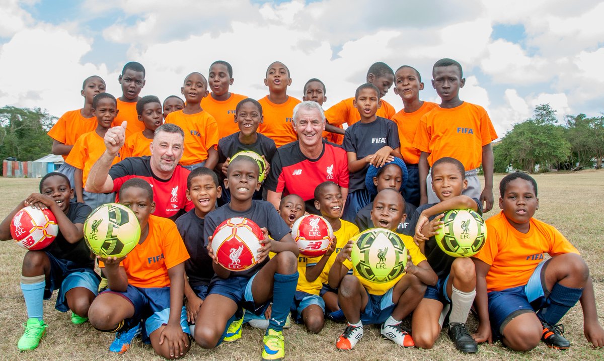 LFC's tweet photo. .@Ian_Rush9 and @Realaldo474 enjoy a coaching session with two local primary schools during their trip to @Barbados https://t.co/UIiuVcbomQ