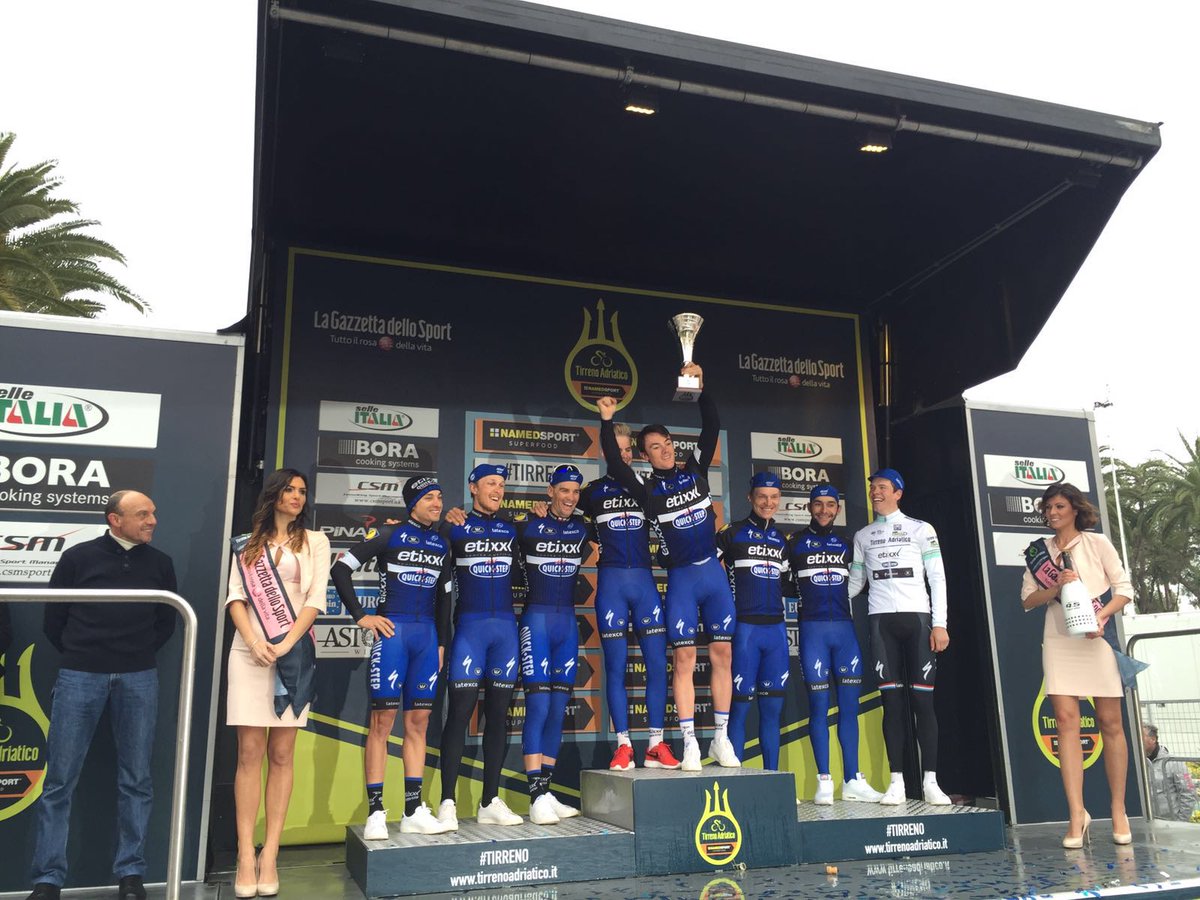 soudalquickstep's tweet photo. A happy team celebrating the trophy for the best team of the race. #Tirreno #WayToRide https://t.co/H3zrKPyn75