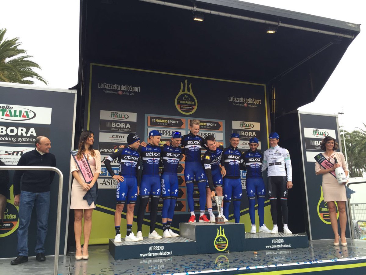 soudalquickstep's tweet photo. A happy team celebrating the trophy for the best team of the race. #Tirreno #WayToRide https://t.co/H3zrKPyn75