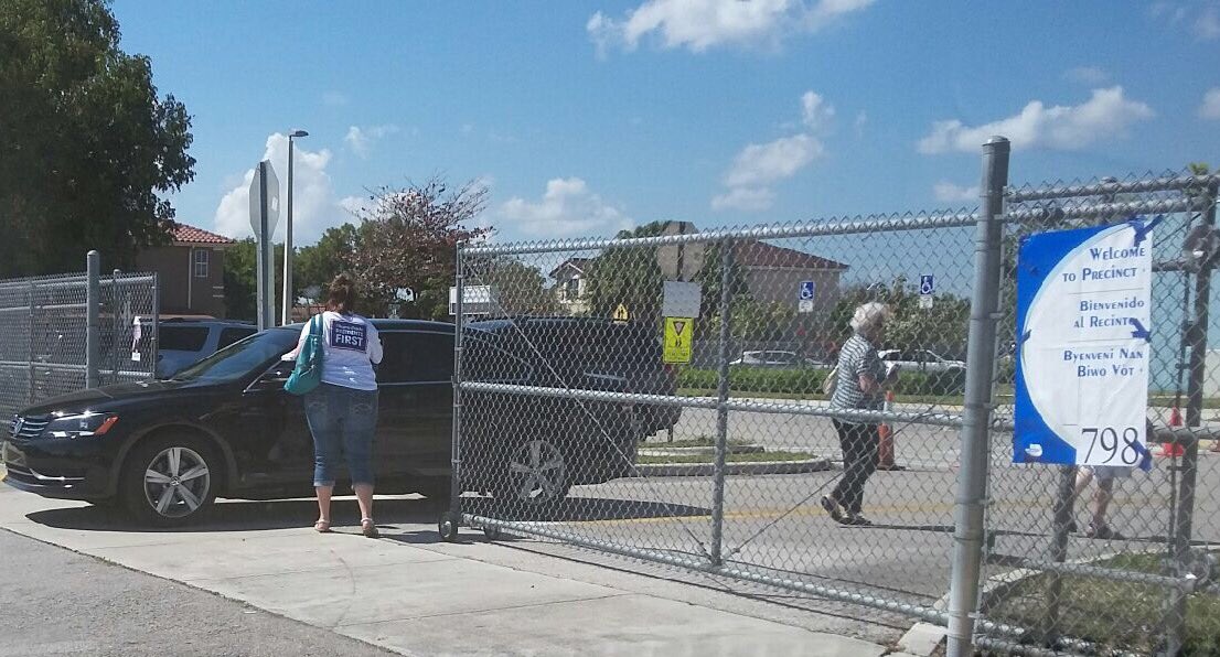 MDResidents1st's tweet photo. Everyone gets a palm card at Dr. Manuel C. Barreiro Elementary School in #MiamiDade #StandWithGimenez https://t.co/5aTL1FqWIH