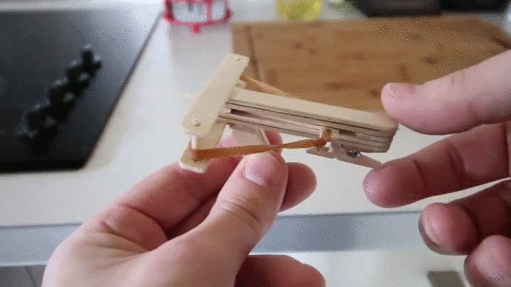Build a tiny crossbow out of popsicle sticks and a clothespin http://trib.a...