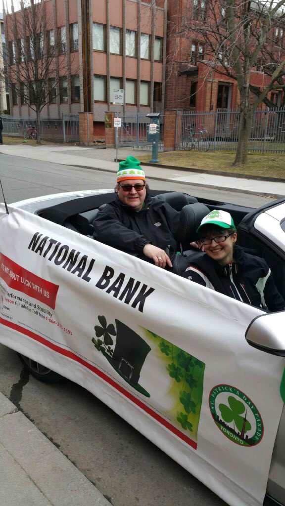StPatricksTo's tweet photo. Rob Hutchinson and his daughter enjoying the parade last Sunday #StPatsTO https://t.co/TeVakyJgNz