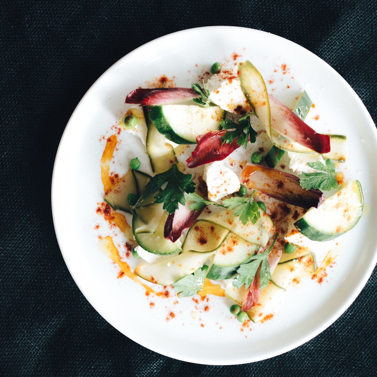 Our cucumber salad is so good and healthy that we had to add black to make it seem more bad ass.