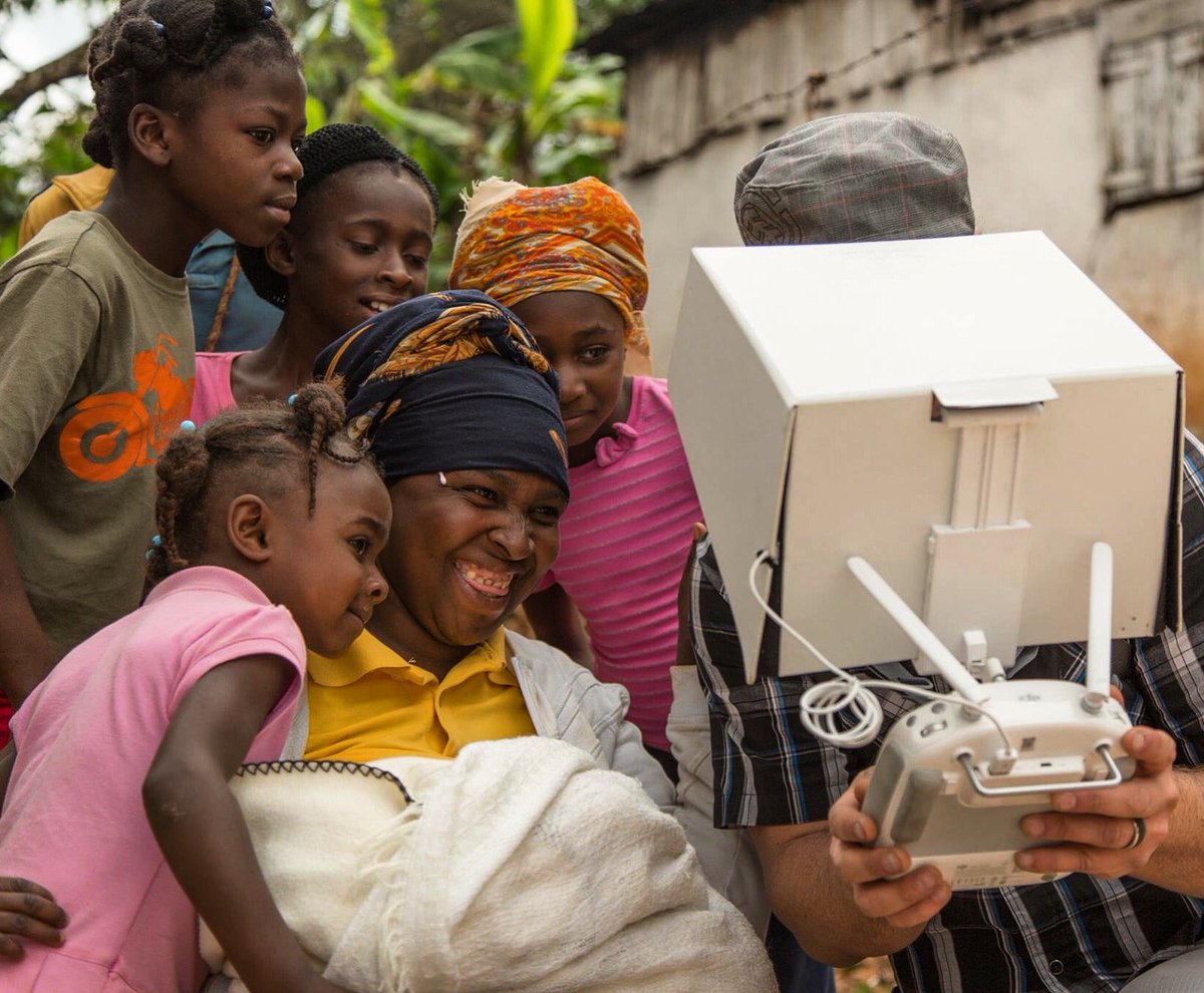 thisisSOULCRAFT's tweet photo. Ti Tet's family laugh as Director Aaron Straight shows them the copter view #DJI #savethedevil #storytelling #Haiti https://t.co/F3gKJ68Dng