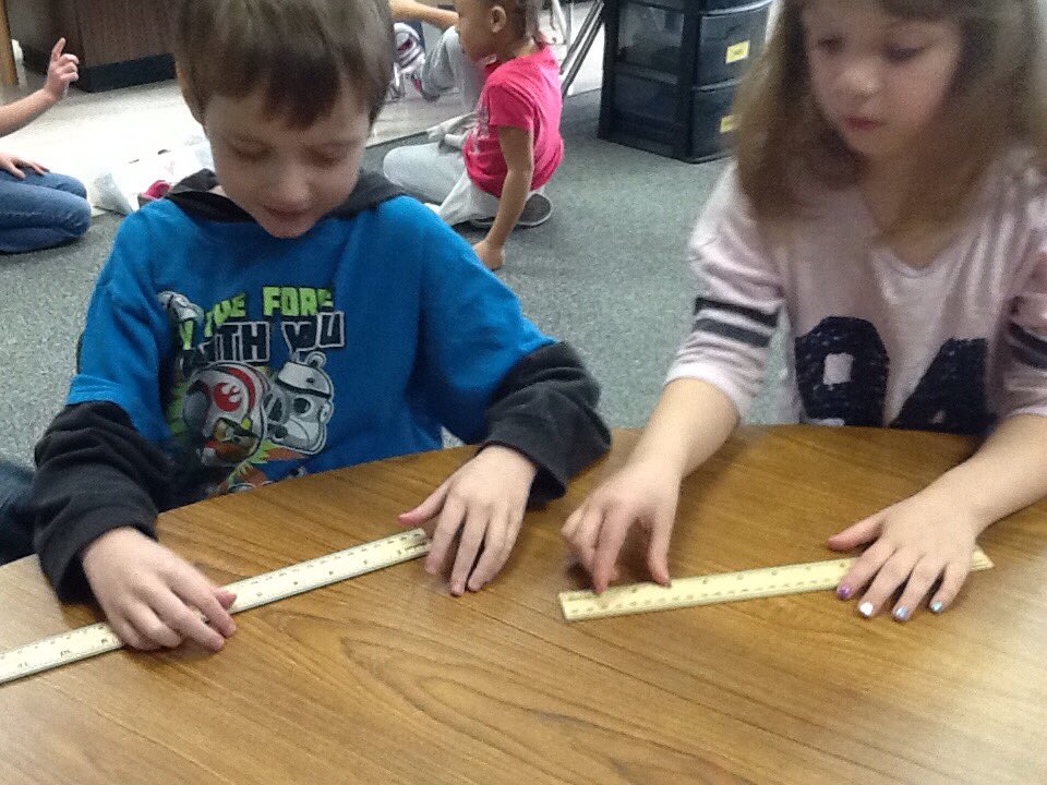 HESKaufman's tweet image. Exploring and comparing cm and inches on the ruler #mathgroup