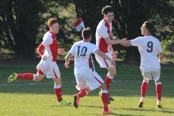 FINAL BOUND! Lewis Clarke celebrates putting Harriers 3-1 up in today’s FCYA League Cup semi final win over Guiseley
