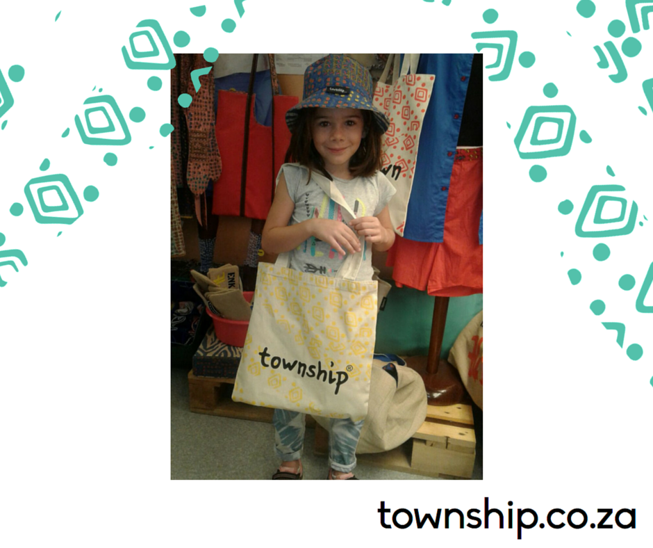 Meet our cutest customer! She was so pleased with her blue Khayelitsha hat and loved the free #Township shopper #bag