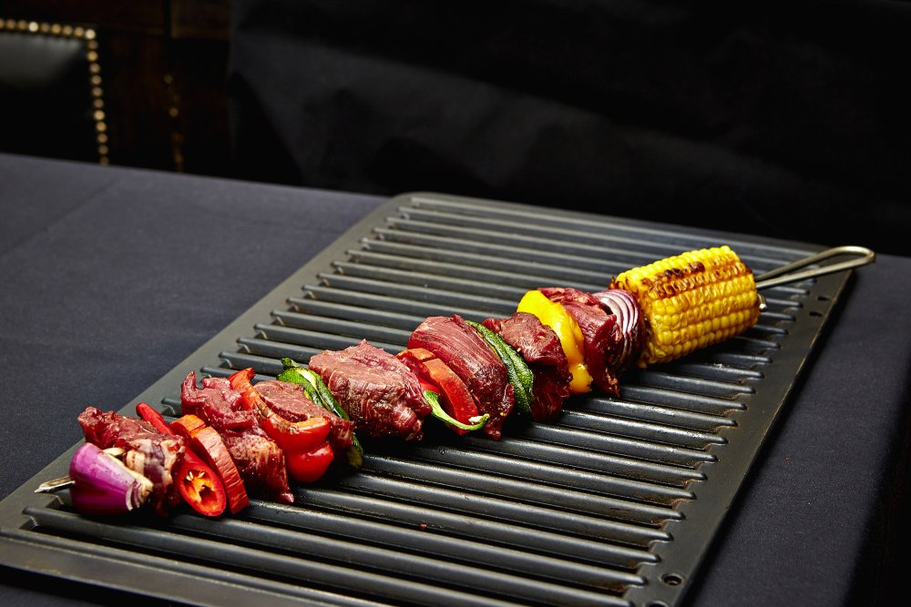 LCAPRG's tweet image. Giant skewer with vegetables (selection of Argentinian meats, chorizo)!Book table online: lacasaargentina.eu/reservation/