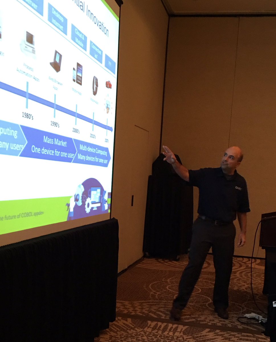 Stage view of <a href="/archie_borland/">Archie Roboostoff</a> in action talking about @BorlandSoftware Atlas and Agile #DevDay