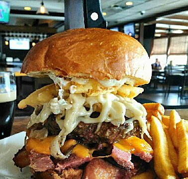Angus Beef/corned beef/Drunken Cheddar/ Swiss/Irish Dressing / Banger Sausage/Rasher Sticks/waffle fries/kraut