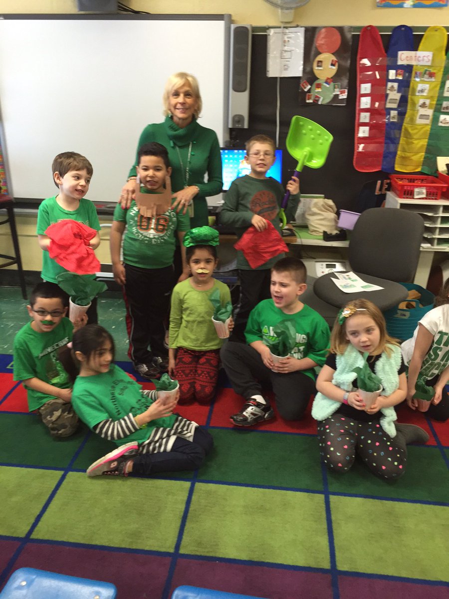 Mrs. Green with Mrs.Herhily's class performing an Irish Folktale The Leprechaun and the Red Handkerchief!