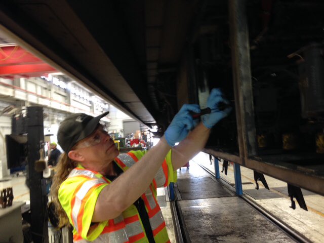 AliciaTrost's tweet photo. . @SFBART vehicle electronic tech timothy ryan works to repair one of the cars damaged yesterday https://t.co/DXztKrMrwb