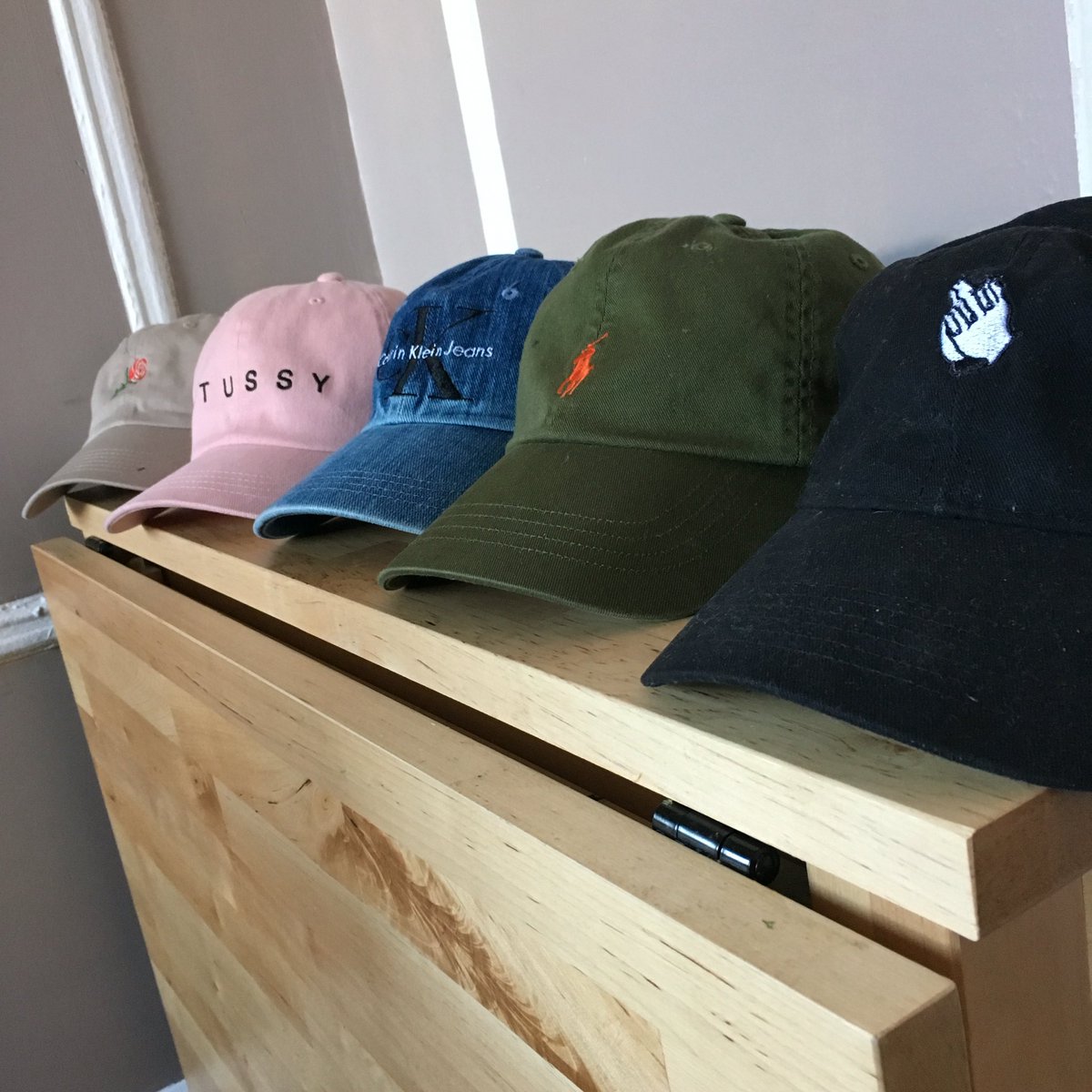 lexahella's tweet photo. My roommates hats are POPPIN https://t.co/CLdpY9IET5
