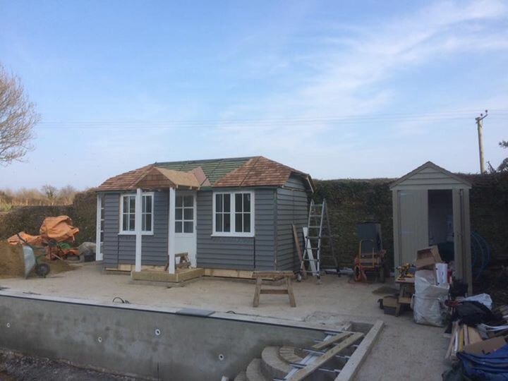 timelessgr's tweet photo. @timelessgr Pool house progressing well. Hipped roof &amp; Overhanging porch completed. https://t.co/kNomDrGWWH