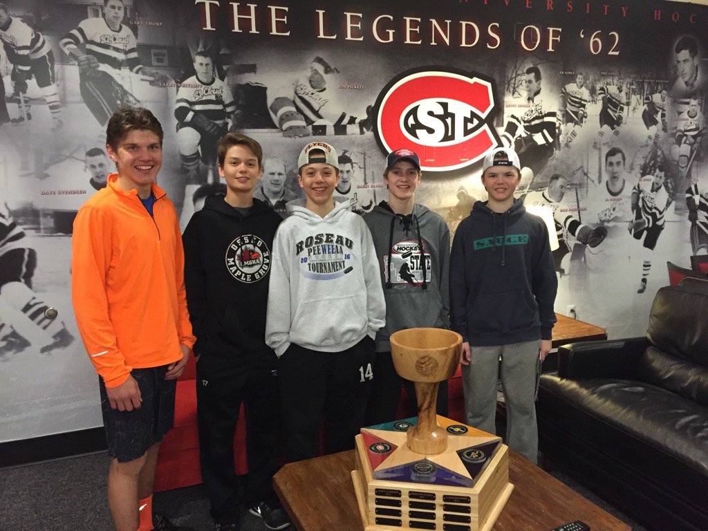 EuroAmHockey's tweet photo. Friends, teammates and opponents getting a tour of SCSU lockerroom after #mnselects #euronation #2002 https://t.co/gC8lqiVCkR