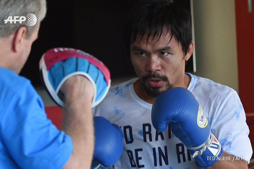 AFP's tweet photo. Manny Pacquiao leaves door open to retirement U-turn https://t.co/dDHUiRB0uO https://t.co/C88wXG8hFl