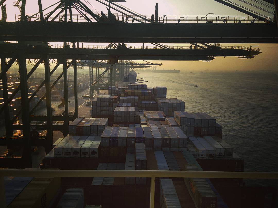 Sunrise in #Singapore, the world's second busiest container port (Photo by Mattias Svenningsen) #Shipping