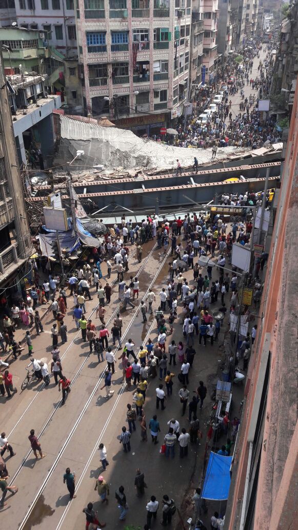 CNNnews18's tweet photo. #BREAKING | #KolkataTragedy is "An Act of God",says IVRCL management,firm which made Kolkata flyover which collapsed https://t.co/7OaswMbBvy