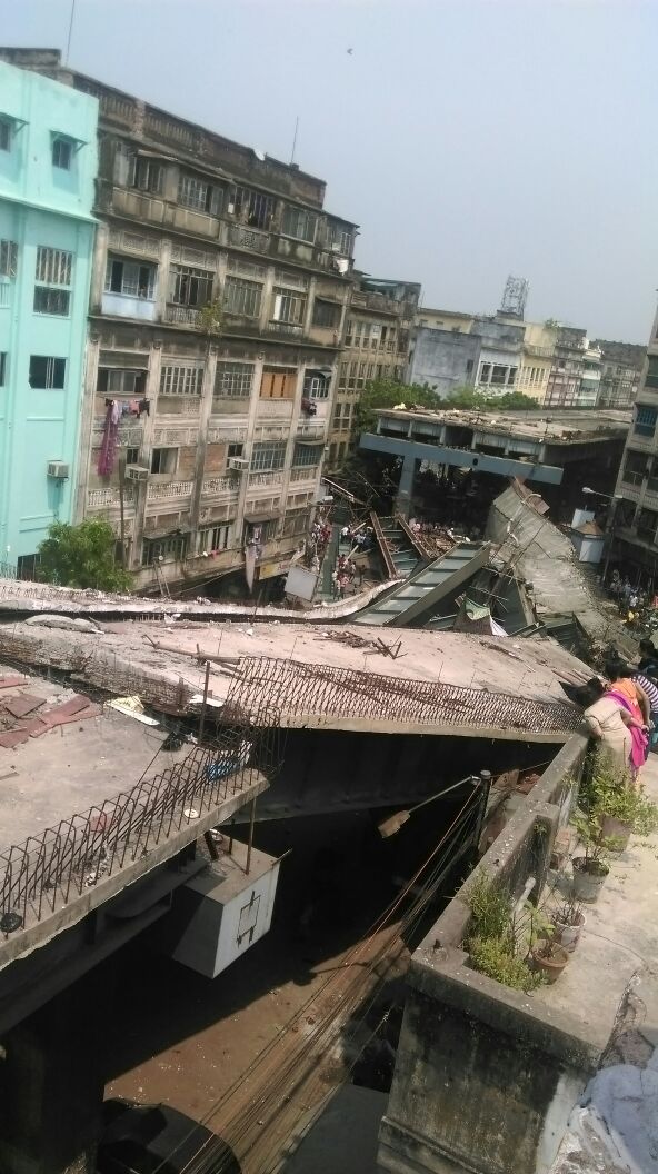CNNnews18's tweet photo. #BREAKING | #KolkataTragedy is "An Act of God",says IVRCL management,firm which made Kolkata flyover which collapsed https://t.co/7OaswMbBvy