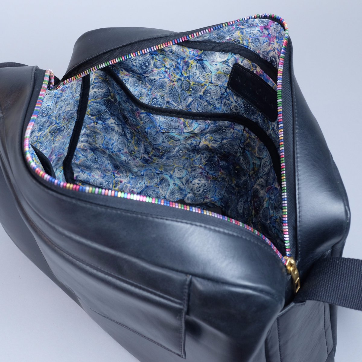 A look inside our messenger bag. #Rainbow #PurpleRain