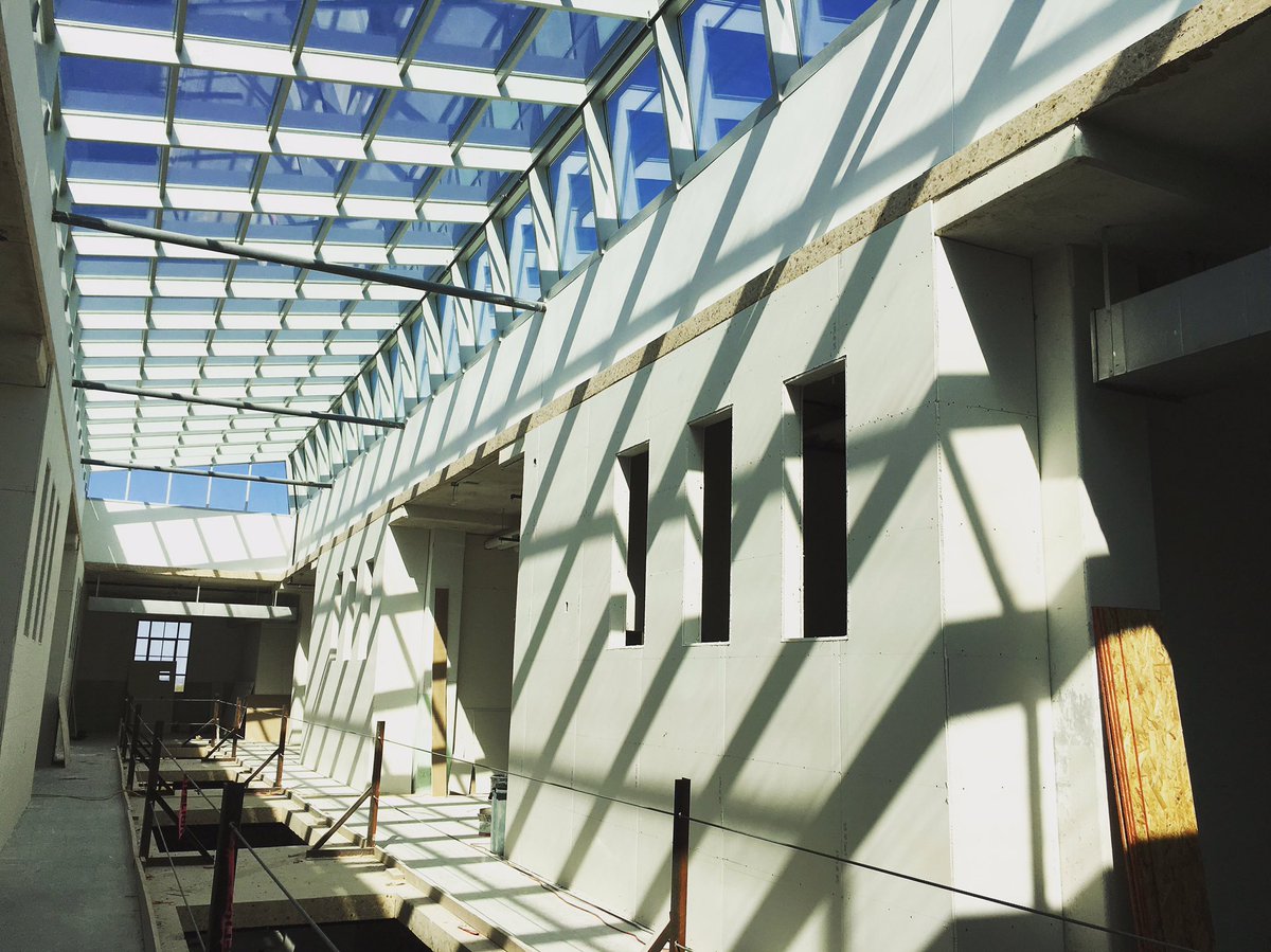 YourConcourse's tweet photo. Shadows and light cover freshly sheetrocked walls in #YourConcourse. https://t.co/lR1AVrL4m3