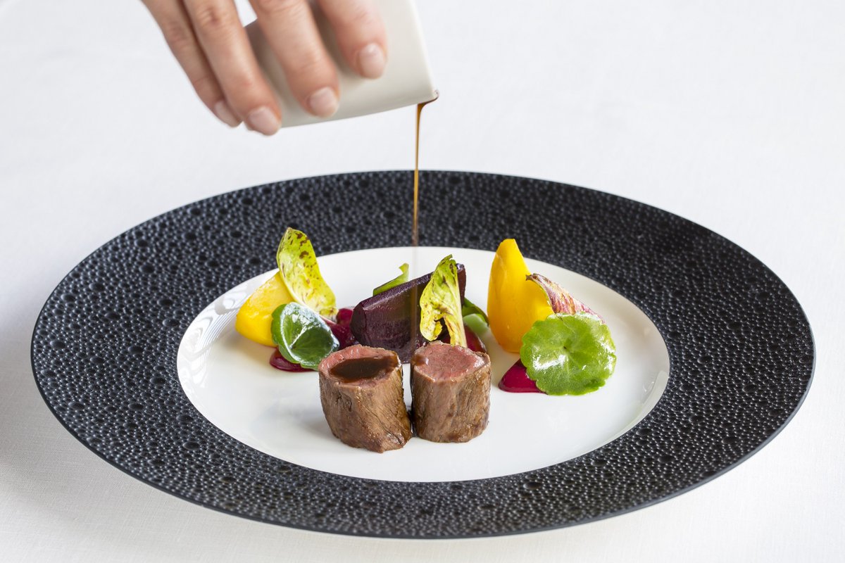 Loin of wild Fallow deer with bone marrow, Grumolo leaves and beetroot