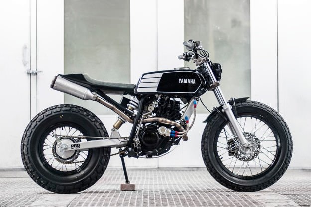 STGMX's tweet photo. The oil cooler really makes this Yamaha T DUB 200 pop! #stgmoto #TW200 #Yamaha #wolfmoto #PIAA #protaper #dunlop https://t.co/HsvYYvJpAP