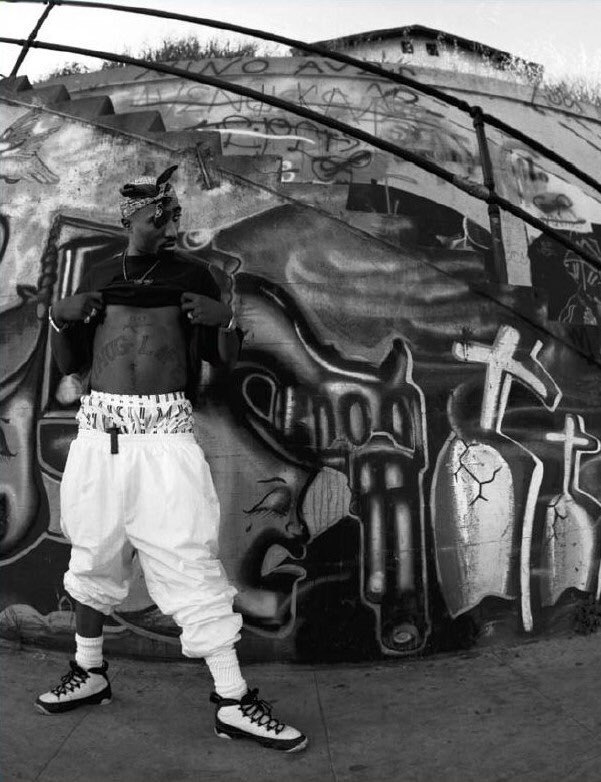 THRONExyz's tweet photo. Tupac in the Jordan 9's #TBT #THRONEThrowback https://t.co/izA2JhLNyx