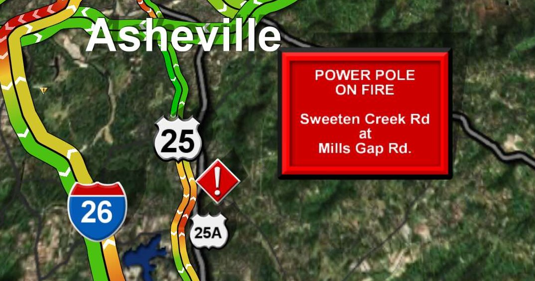 JacDeAug's tweet photo. #TRAFFICALERT: Downed power poles on fire at Sweeten Creek and Mills Gap Road. The roadway is SHUT DOWN right now. https://t.co/G5WAfpzHXS