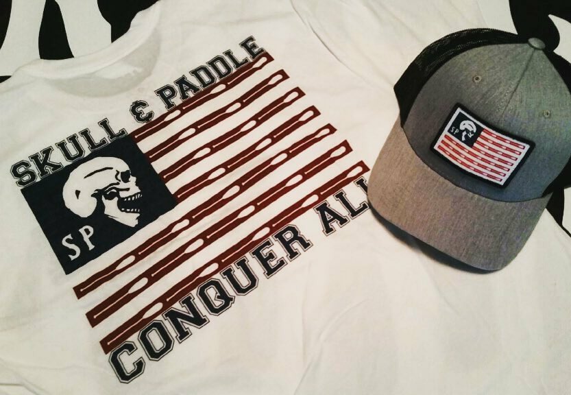 SkullAndPaddle's tweet photo. The 'Conquer All' tee and 'Conquer All Trucker' hat just now available#skullandpaddle #conquerall #supportourtroops https://t.co/ldgIdDRqki