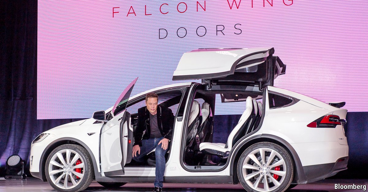 TheEconomist's tweet photo. Tesla's cheaper model will be a harder sell than its trademark high-end ones https://t.co/oaJiSRTcab https://t.co/a67a2X4Xyo