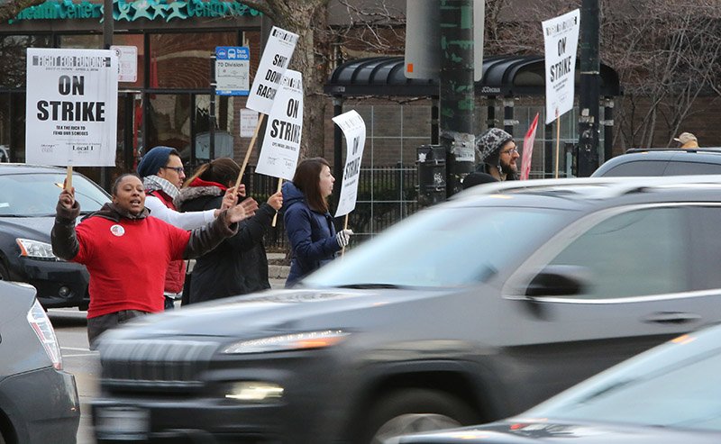 #CTU #CPS Chicago Teachers Union members and their supporters picket outside Roberto Clemente H.S.