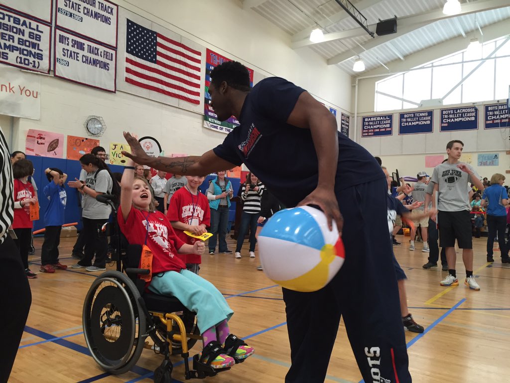 Progression of pics with second-year DE Geneo Grissom captures essence of the Special Olympics event.