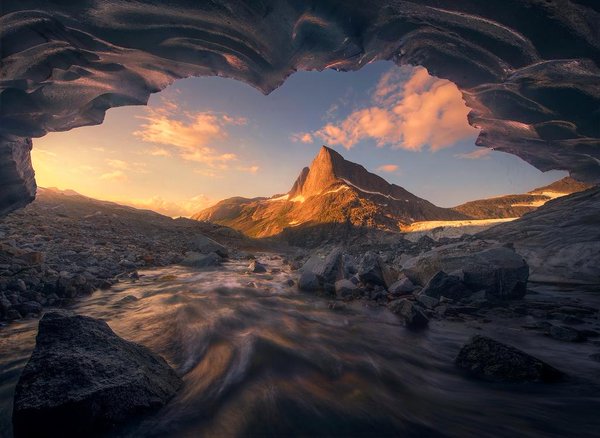 worldoftraveler's tweet photo. Looking out from inside of a glacial ice cave deep in Alaska's coastal mountains, Photo by Marc Adamus https://t.co/SnbGyAqiP3