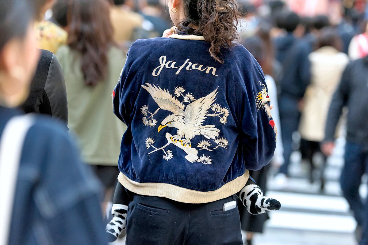 Japanese souvenir jackets on the street in Harajuku today - Sunday