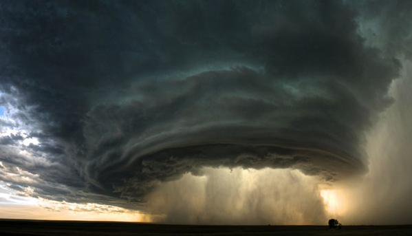 RJSzczerba's tweet photo. Stunning thunderstorm rolls across the Montana prairie at sunset. (Photo by Sean Heavey) #weather https://t.co/BnZsYoNKLx
