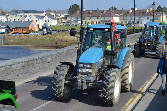 Munsterwin's tweet photo. Going over The Laune in #Killorglan as part of the #MacranaFeirme #Kerry tractor run in aid of #Downsyndrome #Kerry https://t.co/572mbvEfpL