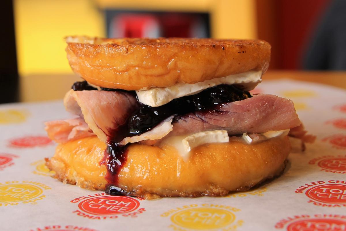 TomAndChee's tweet photo. Blueberry compote, ham, brie, grilled donut. It might be called the #BarbaraBlue but it's got your name on it. https://t.co/jdVOKwvBFO