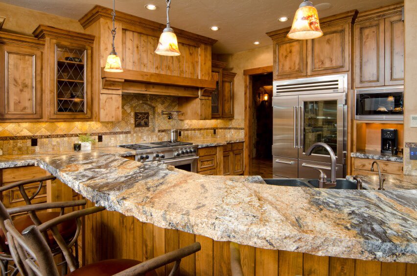 SidcoGranite's tweet photo. Here is a rounded #kitchen #breakfast #bar #island. The #granite is always so #stunning. #Countertops #decor https://t.co/xTVoWslOn9