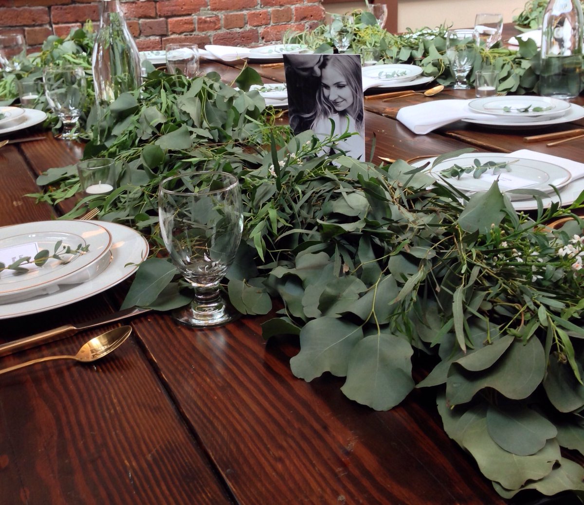 Different photos of the couple were on the backside of each table number. Such a sweet personal touch. #bloombytara