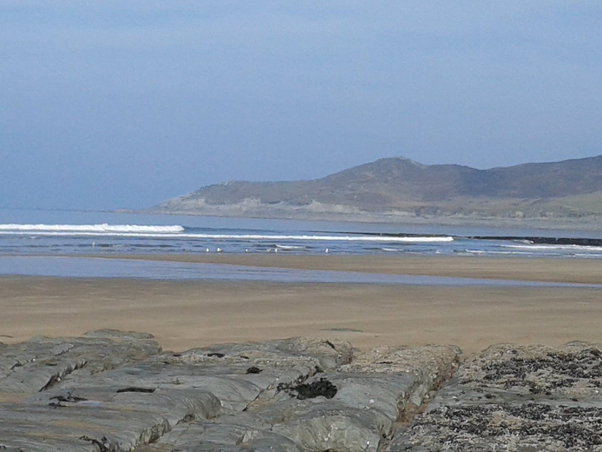Sea, sand and sitting in the sunshine having a drink