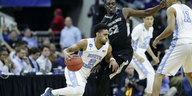 PGC_Coaching's tweet photo. UNC ran this quick hitter that resulted in an open 3-pointer vs Providence https://t.co/rm9cRQPnuY

#MarchMadness https://t.co/Jd7M2t2br0