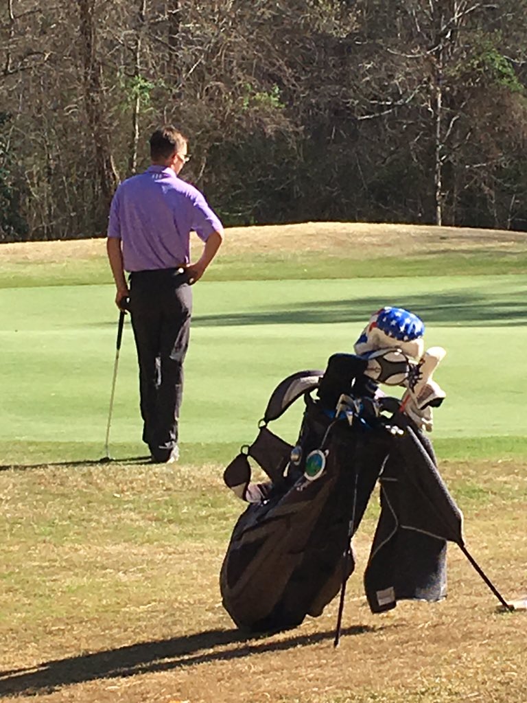 Bloom waits on his birdie putt